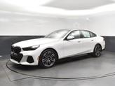 Thumbnail of 2026 Mineral White Metallic BMW 550e