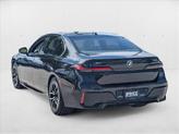 Thumbnail of 2025 Black Sapphire Metallic BMW 740