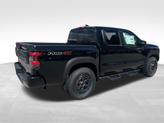 Thumbnail of 2025 Super Black Nissan Frontier