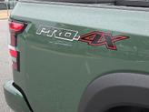 Thumbnail of 2025 Tactical Green Metallic Nissan Frontier