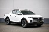 Photo of 2025 Atlas White Hyundai SANTA CRUZ