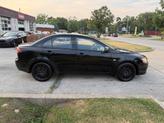 Thumbnail of 2009 Tarmac Black Pearl Mitsubishi Lancer