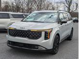 Thumbnail of 2025 Ivory Silver Kia Carnival Hybrid