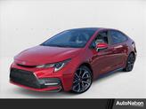 Photo of 2021 Barcelona Red Metallic w/Black Sand Pearl Roof Toyota Corolla