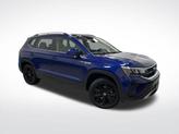 Thumbnail of 2023 Dusk Blue Metallic Volkswagen Taos