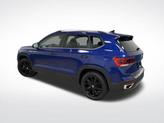Thumbnail of 2023 Dusk Blue Metallic Volkswagen Taos