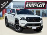 Photo of 2024 Glacier White Nissan Frontier