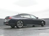 Thumbnail of 2022 Carbon Black Metallic BMW 740