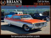 Photo of 1963 Orange w/Gold Flake Buick Wildcat