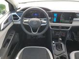 Thumbnail of 2025 Bright Moss Green Metallic Volkswagen Taos