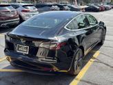 Thumbnail of 2019 Solid Black Tesla Model 3