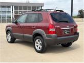 Thumbnail of 2009 Mesa Red Pearl Hyundai TUCSON