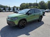 Photo of 2025 Bright Moss Green Metallic/Deep Black Roof Volkswagen Taos