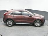 Thumbnail of 2023 Rosewood Metallic Cadillac XT4
