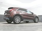 Thumbnail of 2023 Rosewood Metallic Cadillac XT4