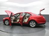 Thumbnail of 2012 Red Candy Metallic Tinted Ford Taurus