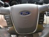 Thumbnail of 2012 Red Candy Metallic Tinted Ford Taurus