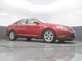 Thumbnail of 2012 Red Candy Metallic Tinted Ford Taurus