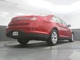 Thumbnail of 2012 Red Candy Metallic Tinted Ford Taurus