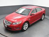 Thumbnail of 2012 Red Candy Metallic Tinted Ford Taurus