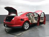 Thumbnail of 2012 Red Candy Metallic Tinted Ford Taurus