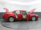 Thumbnail of 2012 Red Candy Metallic Tinted Ford Taurus