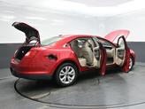 Thumbnail of 2012 Red Candy Metallic Tinted Ford Taurus