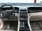 Thumbnail of 2012 Red Candy Metallic Tinted Ford Taurus