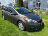 Photo of 2014 Metallic Bronze Kia Forte