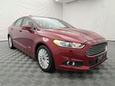 Thumbnail of 2014 Ruby Red Metallic Tinted Clearcoat Ford Fusion Energi