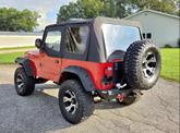 Thumbnail of 1995 Red Jeep Wrangler