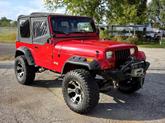 Thumbnail of 1995 Red Jeep Wrangler