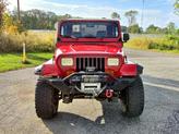 Thumbnail of 1995 Red Jeep Wrangler