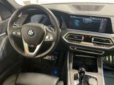 Thumbnail of 2023 Mineral White Metallic BMW X5 PHEV
