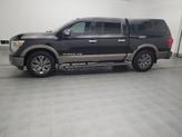 Thumbnail of 2018 Magnetic Black Nissan Titan