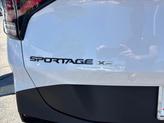 Thumbnail of 2025 Glacier White Pearl/Ebony Black Roof Kia Sportage