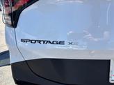 Thumbnail of 2025 Glacier White Pearl/Ebony Black Roof Kia Sportage
