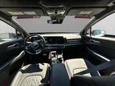 Thumbnail of 2025 Glacier White Pearl/Ebony Black Roof Kia Sportage