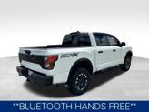 Thumbnail of 2024 Glacier White Nissan Titan