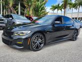 Thumbnail of 2022 Black Sapphire Metallic BMW 330e