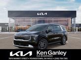 Photo of 2026 Aurora Black Pearl Kia Carnival Hybrid