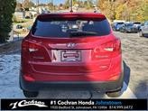 Thumbnail of 2011 Garnet Red Hyundai TUCSON