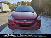 Thumbnail of 2011 Garnet Red Hyundai TUCSON
