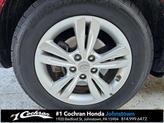 Thumbnail of 2011 Garnet Red Hyundai TUCSON