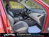 Thumbnail of 2011 Garnet Red Hyundai TUCSON