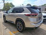 Thumbnail of 2024 Champagne Silver Metallic/Super Black Nissan Rogue