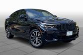 Thumbnail of 2023 Carbon Black Metallic BMW X6