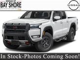 Photo of 2025 Glacier White Nissan Frontier