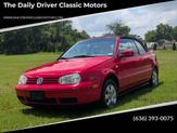 Photo of 2002 Red Volkswagen Cabrio