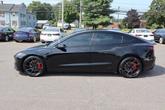 Thumbnail of 2024 Solid Black Tesla Model 3